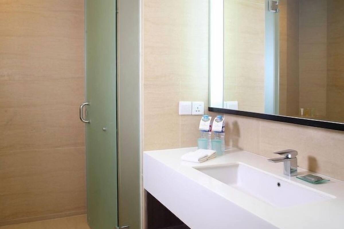 Bathroom | Shower, free toiletries, hair dryer, slippers
