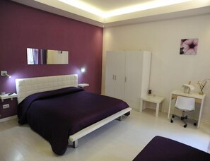 Triple Room, Courtyard View | Premium bedding, individually decorated, desk, free WiFi