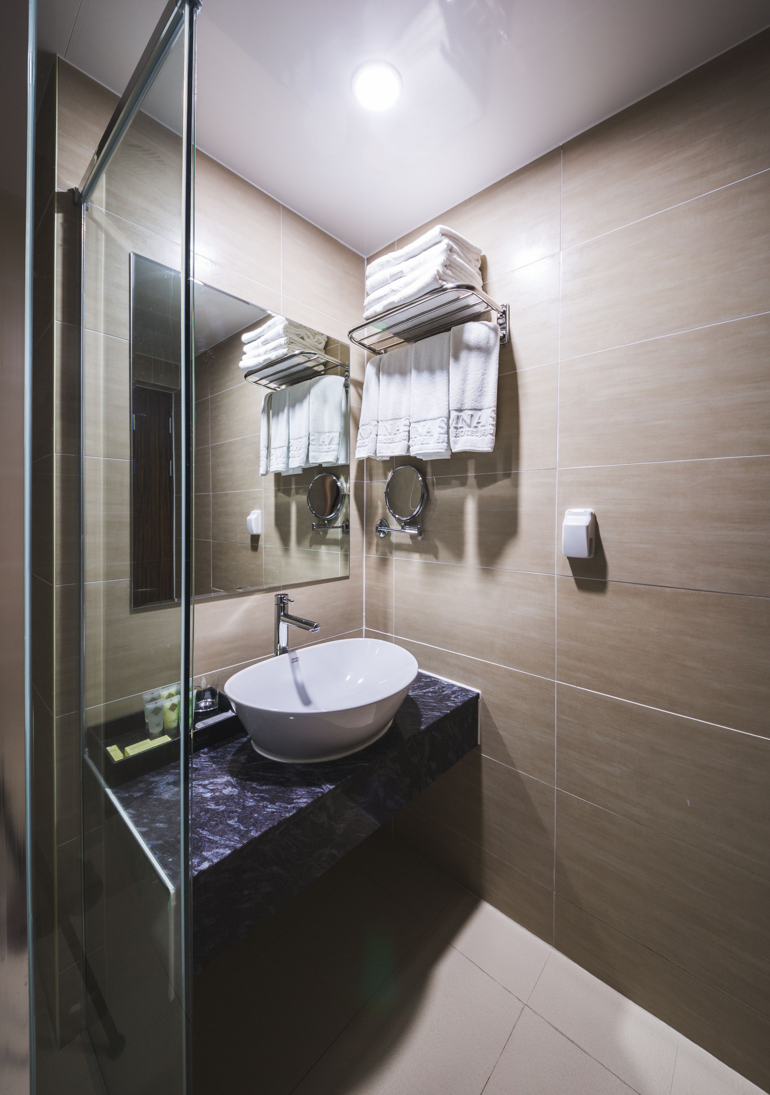 shower, hair dryer, bathrobes, slippers