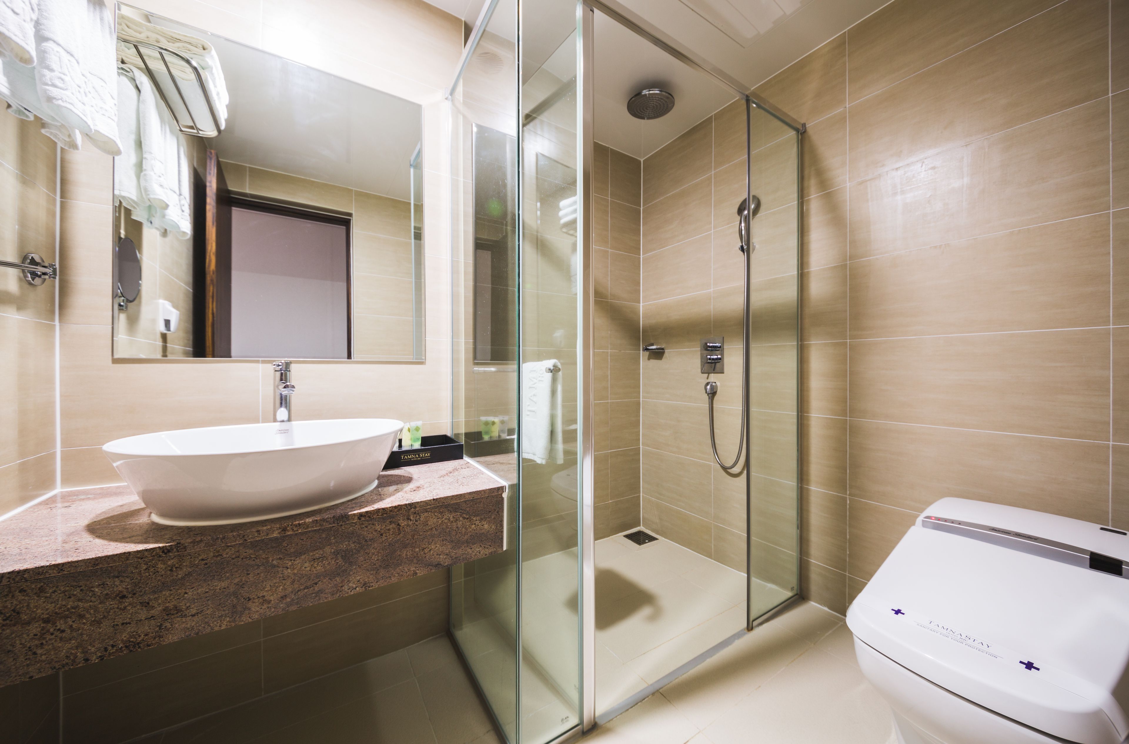 ocean squire twin room | bathroom | shower, hair dryer, bathrobes, slippers