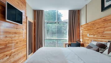 Ropa de cama de alta calidad, minibar, escritorio y cortinas blackout