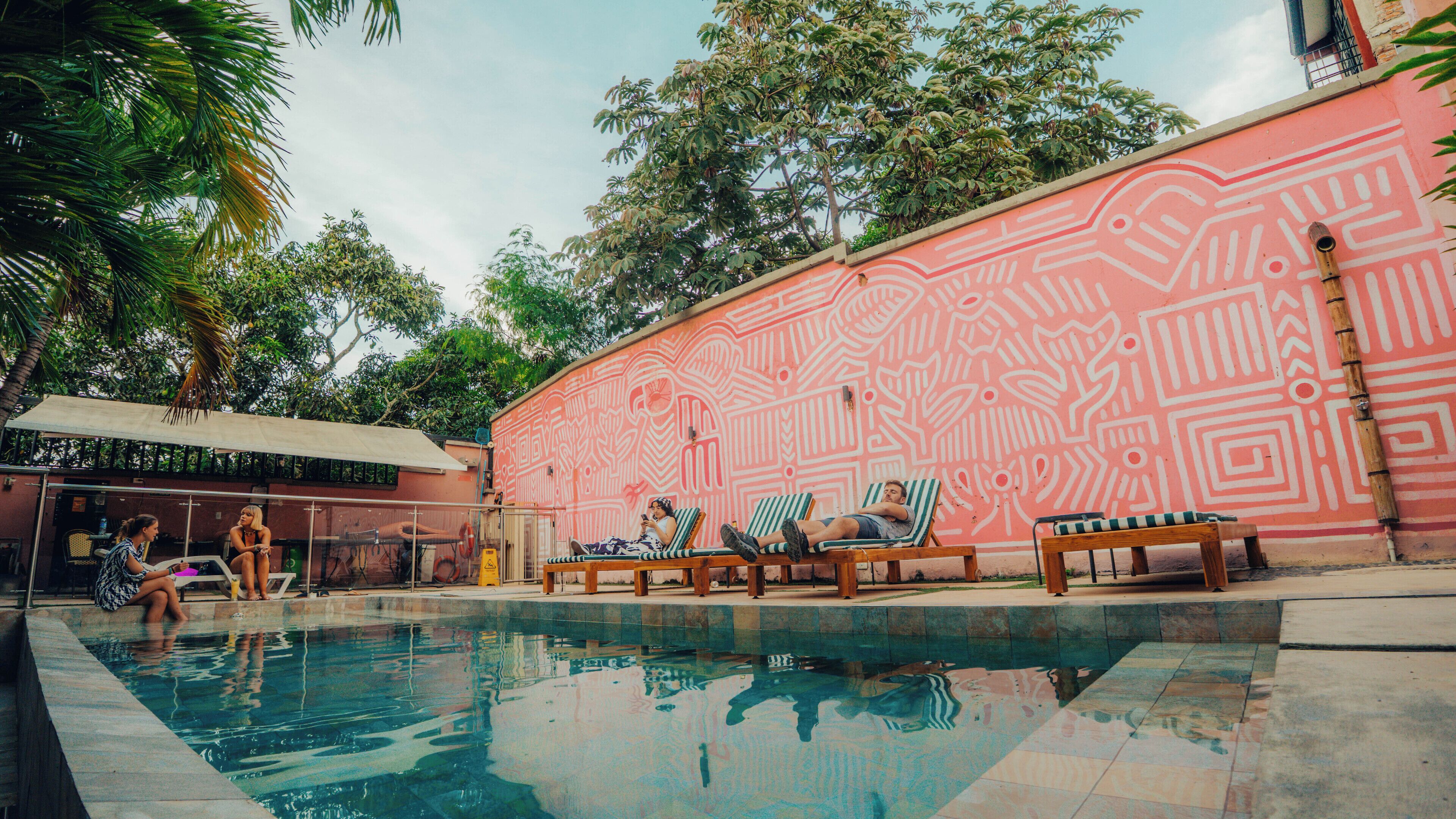 Outdoor pool, open 7:00 AM to 10:00 PM, pool umbrellas, sun loungers