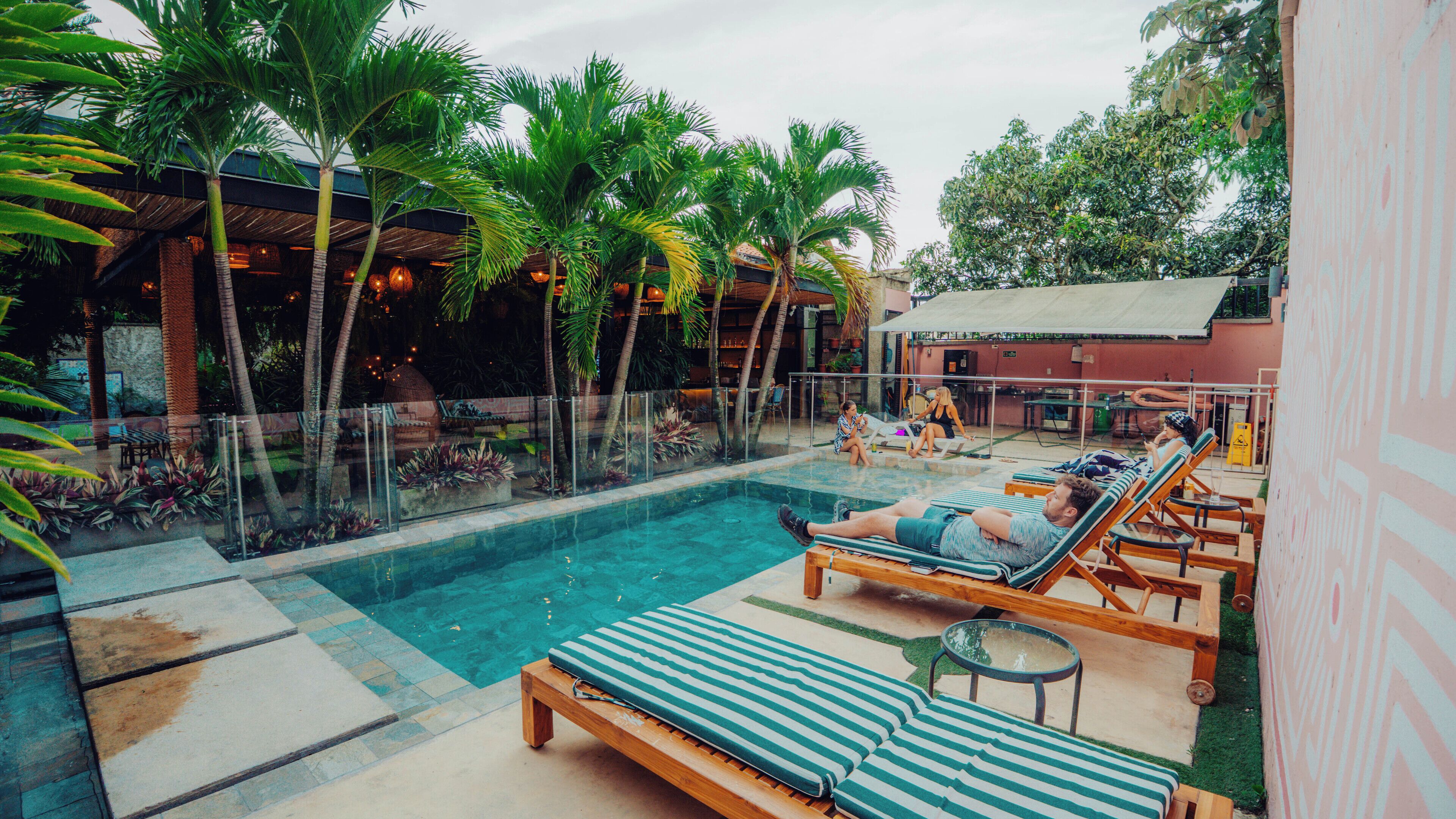 Outdoor pool, open 7:00 AM to 10:00 PM, pool umbrellas, sun loungers