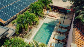 Outdoor pool, open 7:00 AM to 10:00 PM, pool umbrellas, pool loungers