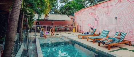 Outdoor pool, open 7:00 AM to 10:00 PM, pool umbrellas, pool loungers