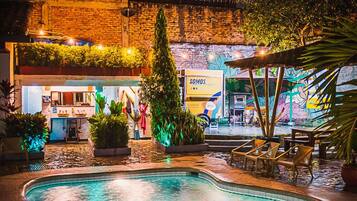 Outdoor pool, open 7:00 AM to 10:00 PM, pool umbrellas, pool loungers