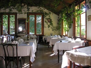 Breakfast, lunch, dinner served; local cuisine 