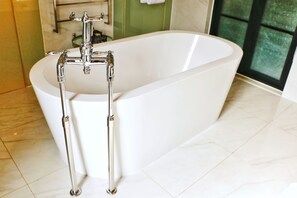 Shower, free toiletries, slippers, towels