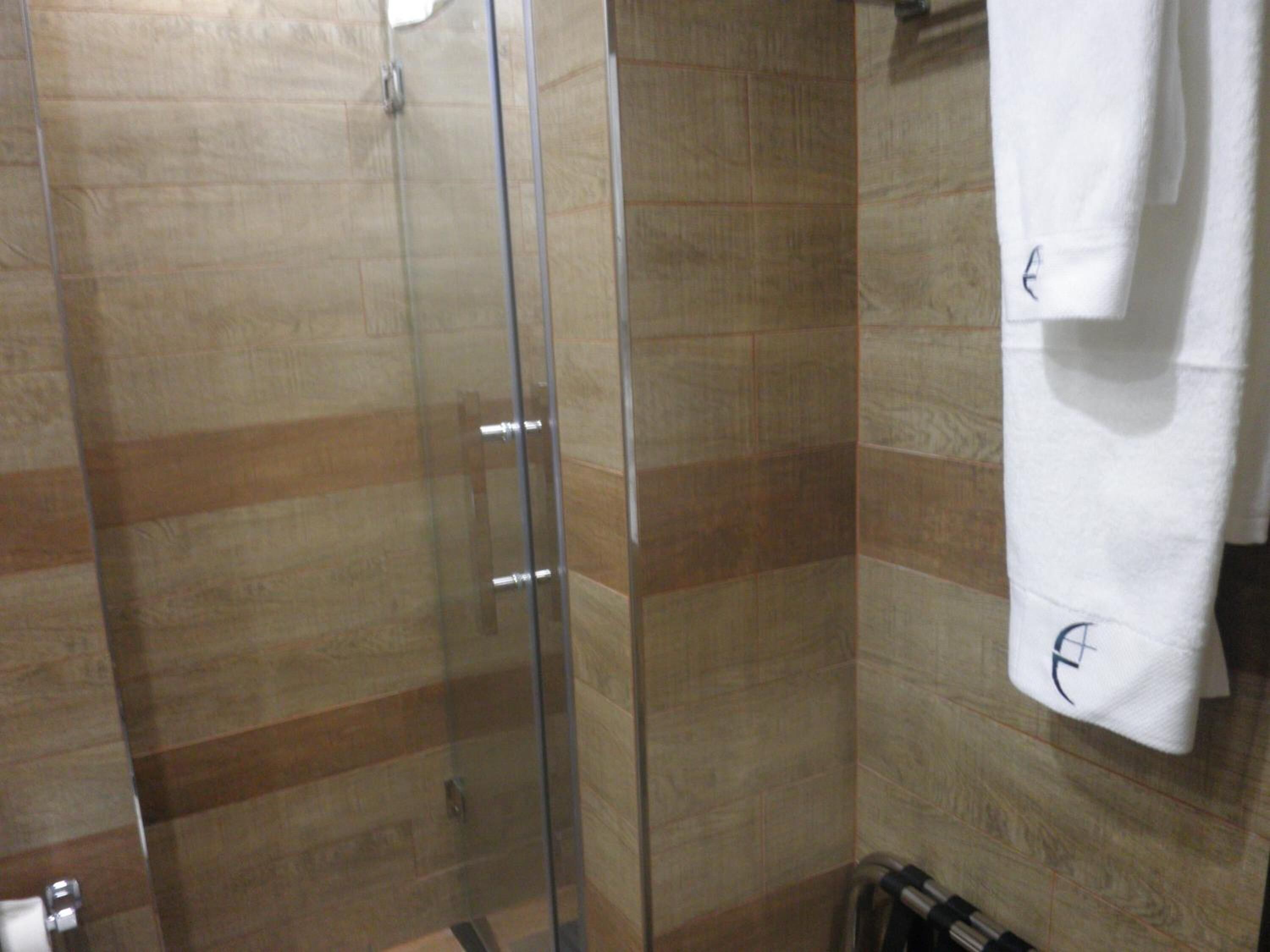 shower, free toiletries, towels, soap