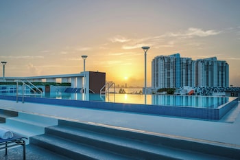 Outdoor pool, open 7:00 AM to 10:00 PM, sun loungers at Residence Inn by Marriott Miami Beach South Beach