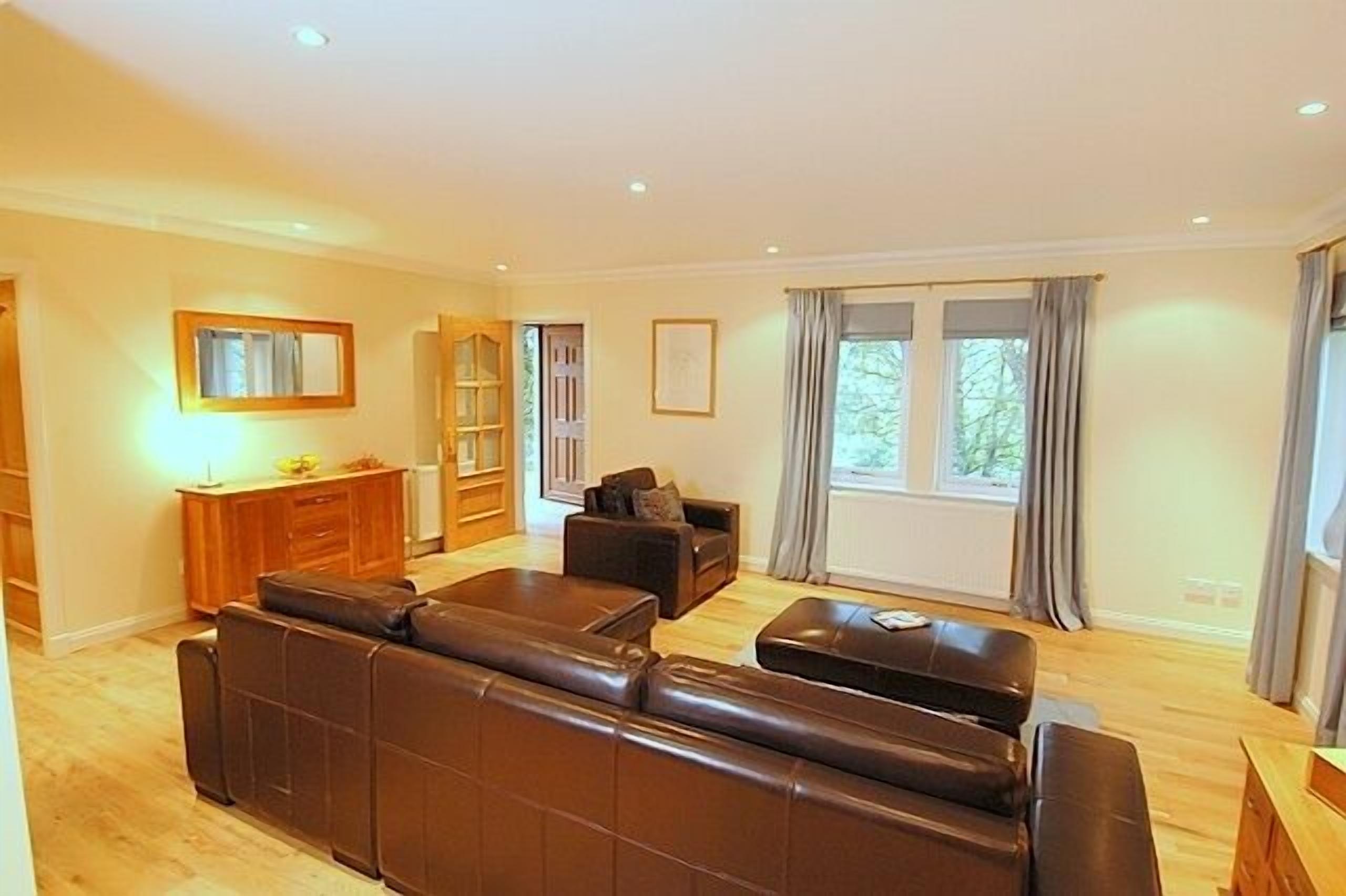 Standard Cottage, 2 Bedrooms (four poster double + bunkbed) | Living room | Flat-screen TV, DVD player