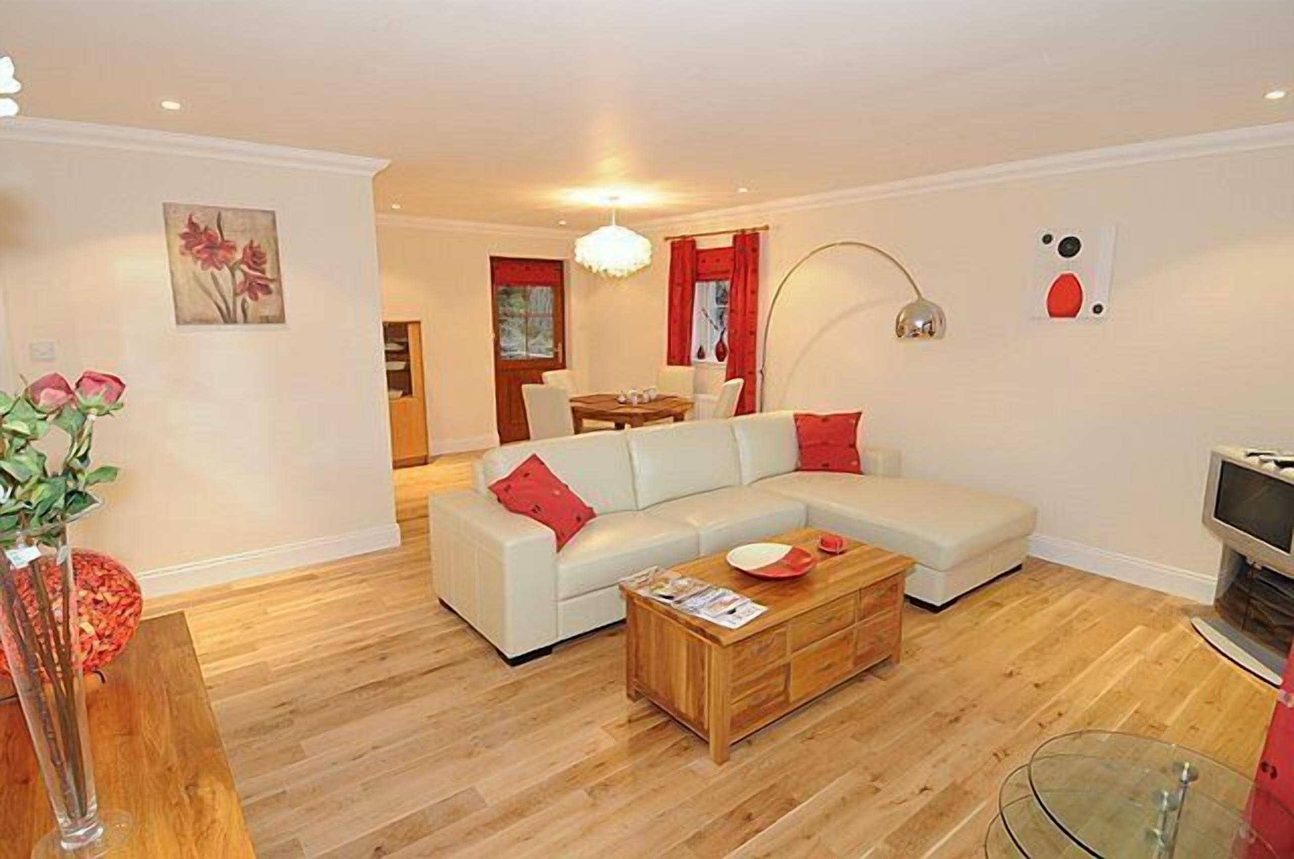 Standard Cottage, 1 Bedroom | Living room | Flat-screen TV, DVD player