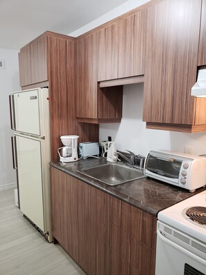 Comfort-Zimmer, 1 Schlafzimmer | Gemeinschaftsküche | Kühlschrank, Mikrowelle, Ofen, Herdplatte