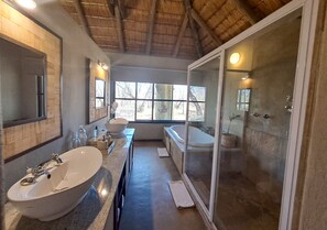 Double or Twin Room (1) | Bathroom | Separate tub and shower, deep soaking tub, hair dryer, towels - Xanatseni Private Camp (Klaserie Private Nature Reserve)