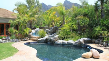 Outdoor pool, pool umbrellas, pool loungers