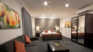 Premium bedding, desk, blackout drapes, iron/ironing board