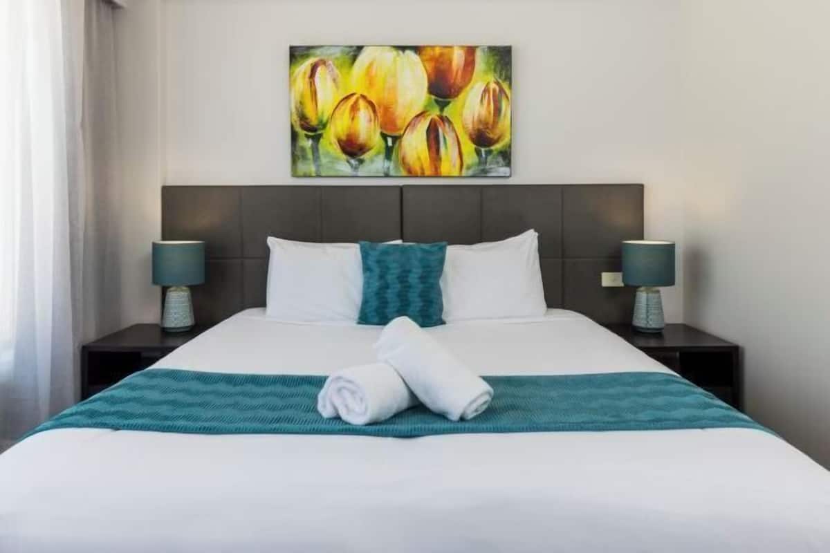 Premium bedding, down duvets, desk, blackout curtains