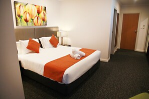 Premium bedding, desk, blackout drapes, iron/ironing board