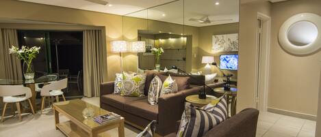 Self-Catering Apartment | Living room | 40-inch flat-screen TV with satellite channels, TV