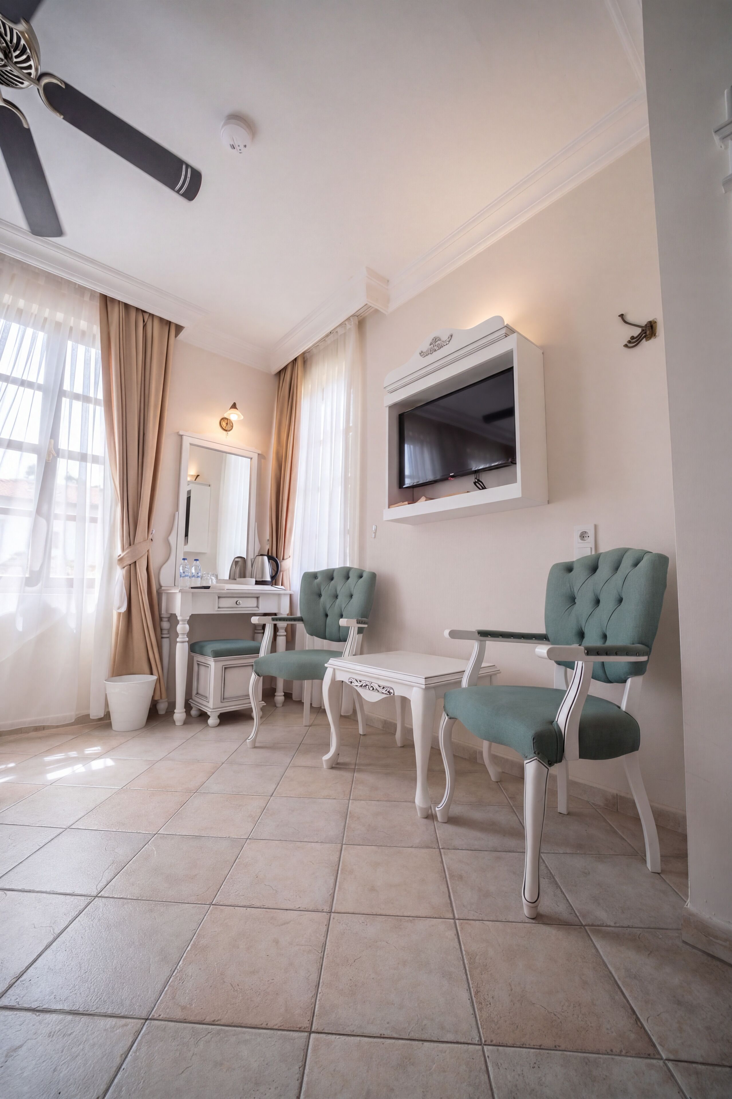 Superior Room | Living area | 32-inch LED TV with satellite channels, TV