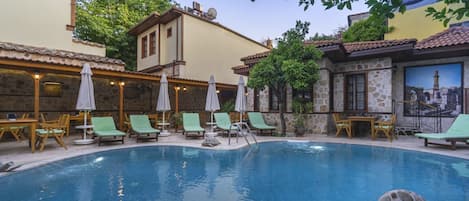 Seasonal outdoor pool, pool umbrellas, sun loungers