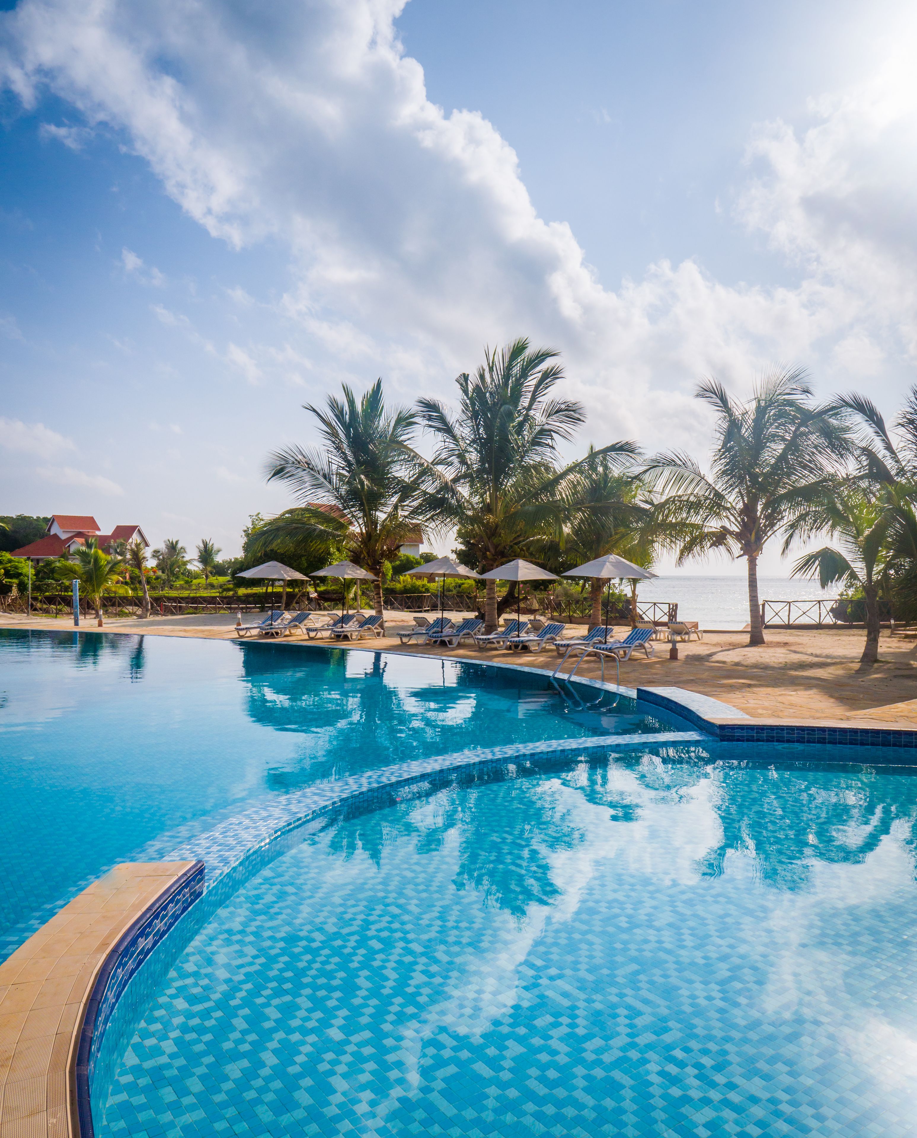 Outdoor pool, pool umbrellas, sun loungers
