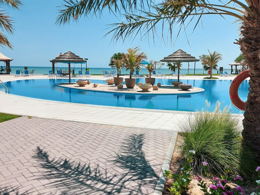 2 outdoor pools, open 9 AM to 7 PM, pool loungers