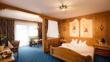 Junior Suite, Balcony, Mountain View | In-room safe, desk, free WiFi, bed sheets