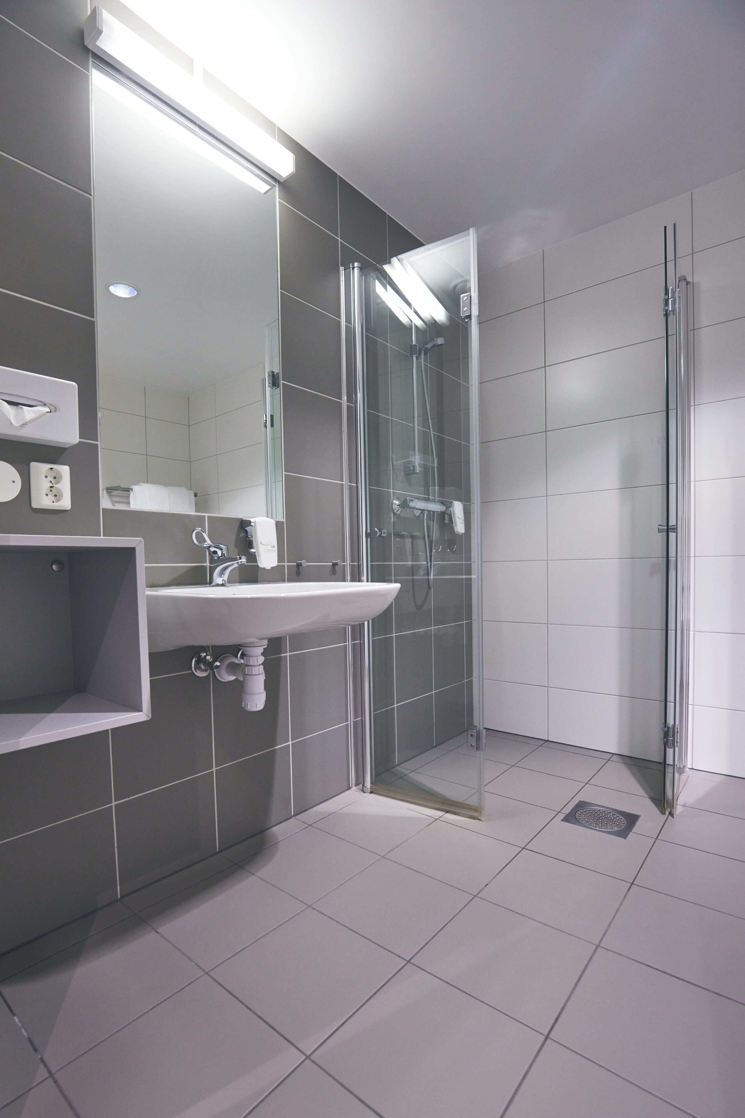 shower, eco-friendly toiletries, towels