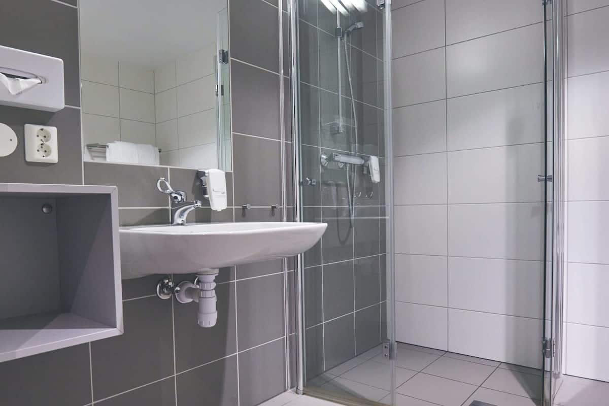 shower, eco-friendly toiletries, towels