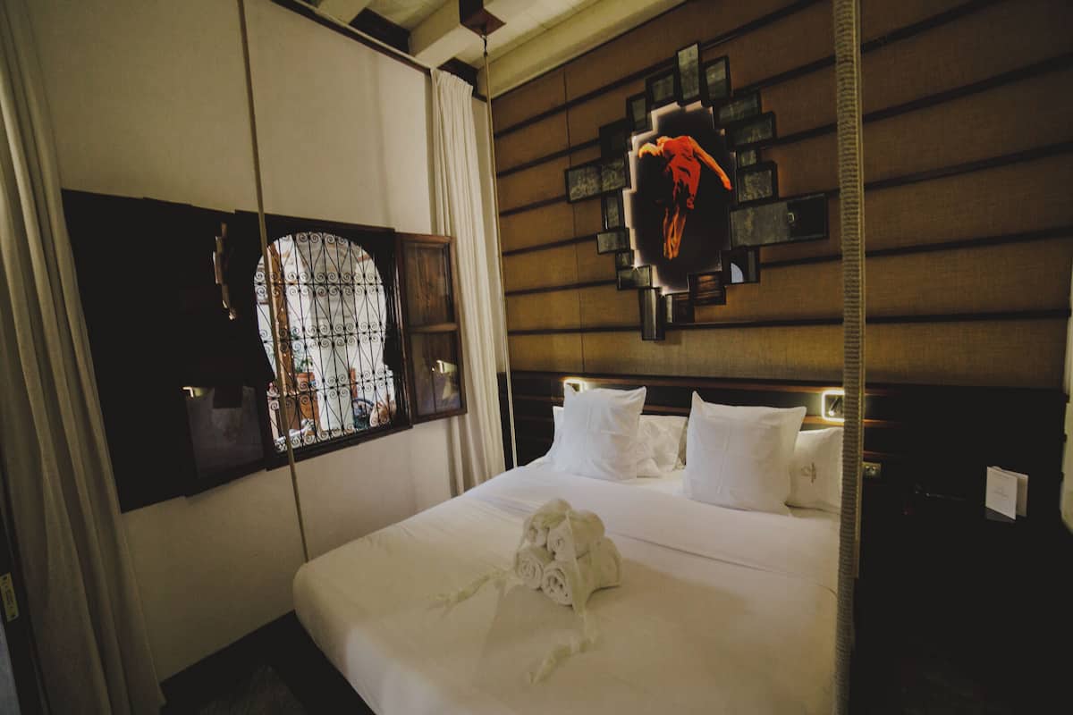 city room, courtyard view (quelo) | premium bedding, down duvets, pillow-top beds, in-room safe