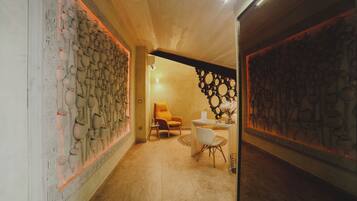 Deluxe Room (Hypnos) | Living area | Flat-screen TV