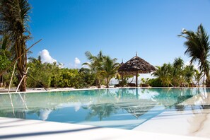 Outdoor pool, pool umbrellas, sun loungers