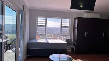 Bells and Whistles | 4 bedrooms, memory-foam beds, iron/ironing board, free WiFi