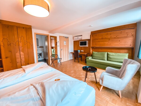Apartamento, 1 quarto | 1 quarto, roupas de cama antialérgicas, frigobar, cofres nos quartos