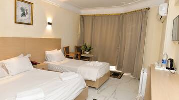 1 bedroom, premium bedding, laptop workspace, WiFi