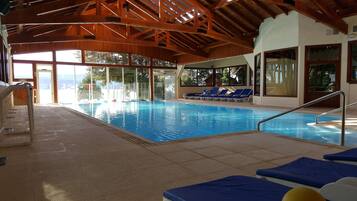 2 indoor pools, open 11:00 AM to 8:00 PM, pool loungers