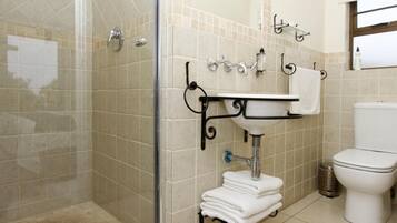 Shower, bathrobes, towels