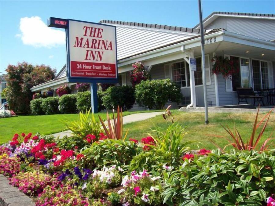 A hotel named "The Marina Inn" with a 24-hour front desk, continental breakfast, and wireless internet.