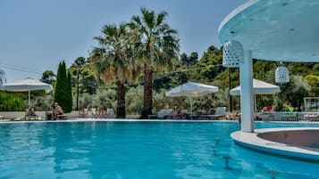 Outdoor pool, open 9:30 AM to 8:00 PM, pool umbrellas, pool loungers