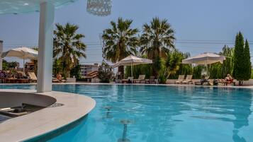 Outdoor pool, open 9:30 AM to 8:00 PM, pool umbrellas, pool loungers