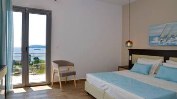 Family Bungalow, Sea View | Hypo-allergenic bedding, minibar, in-room safe, desk