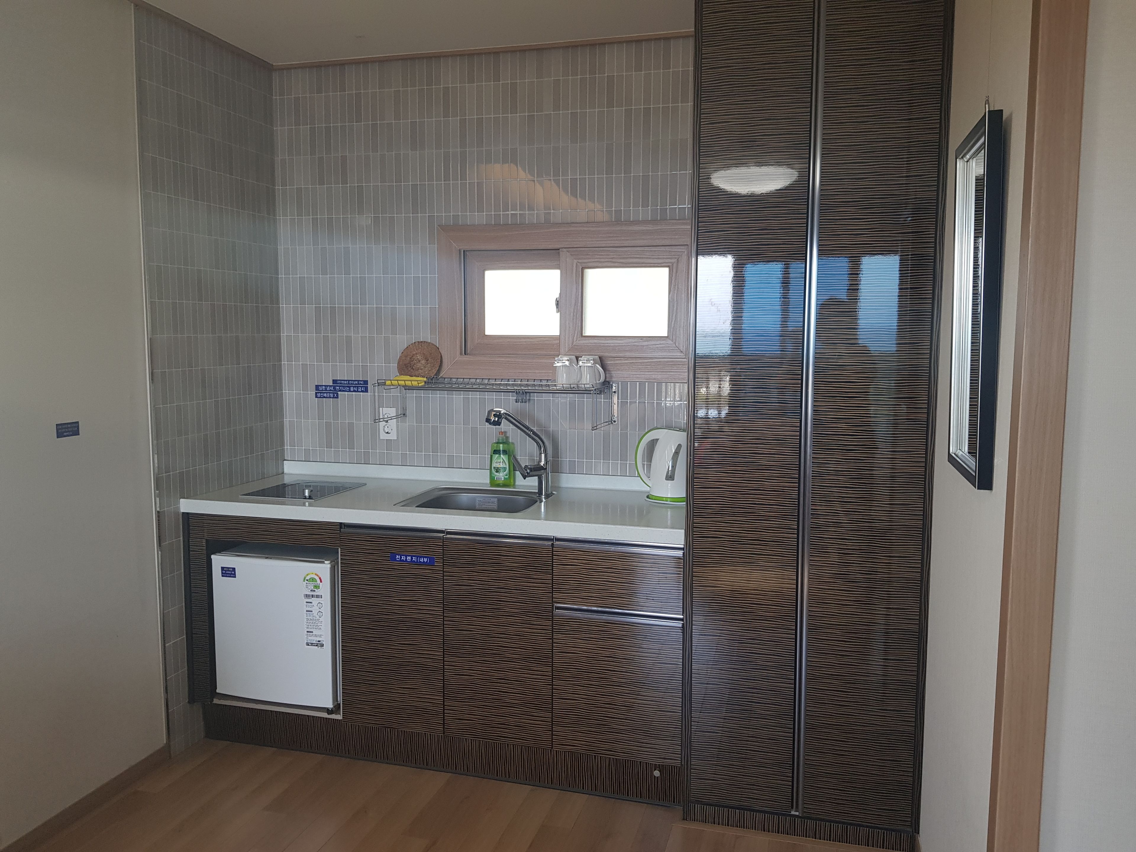 island | private kitchenette | fridge, microwave, stovetop, electric kettle