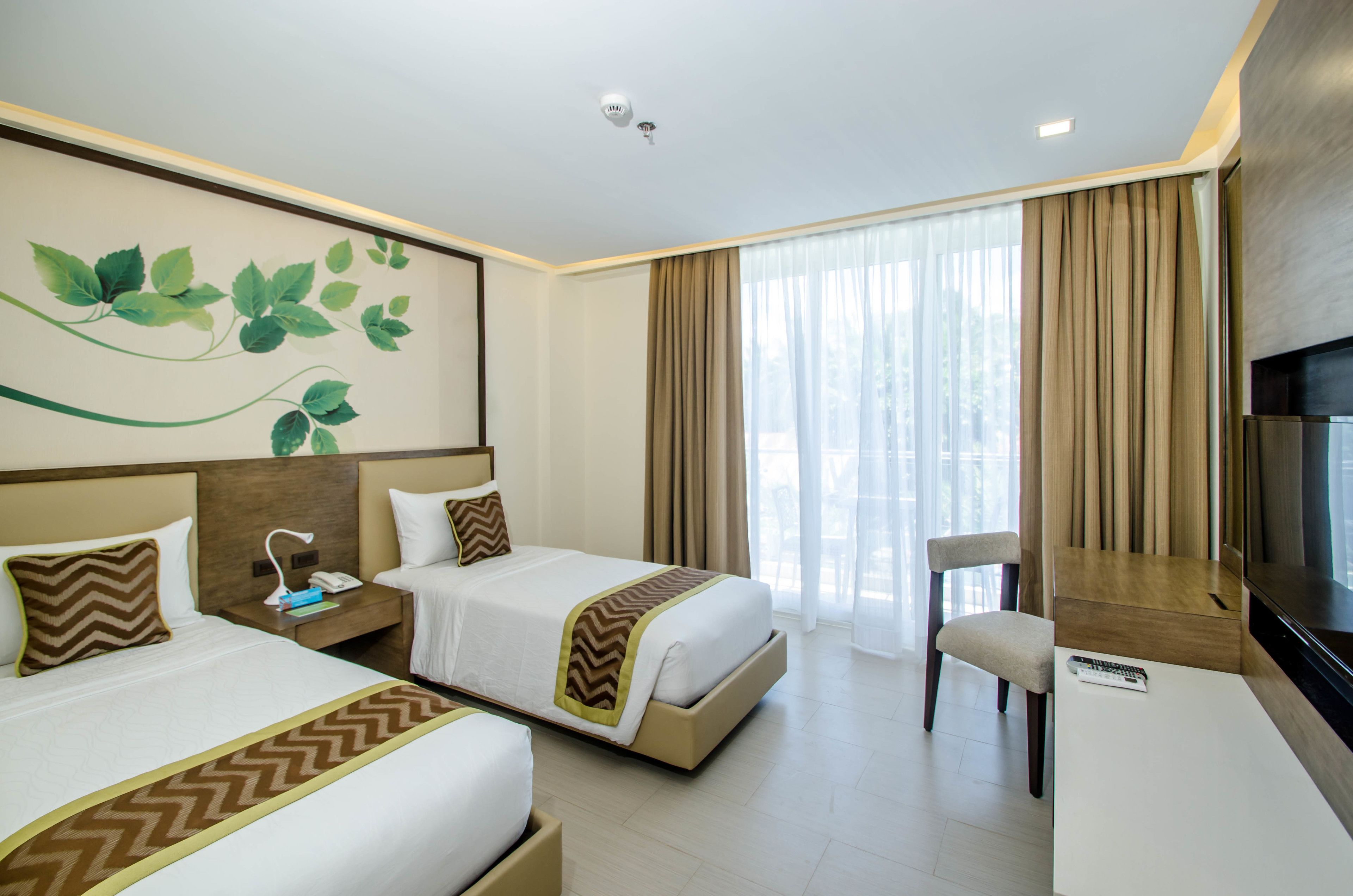 deluxe room with pool view | minibar, in-room safe, desk, laptop workspace