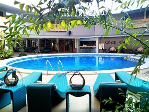 Outdoor pool, open 7:00 AM to 10:00 PM, sun loungers - The Oriental Bataan (Mariveles)