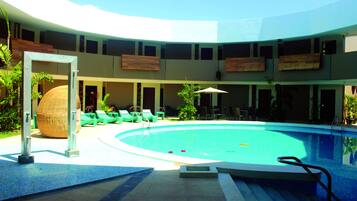 Outdoor pool, open 7:00 AM to 10:00 PM, pool loungers