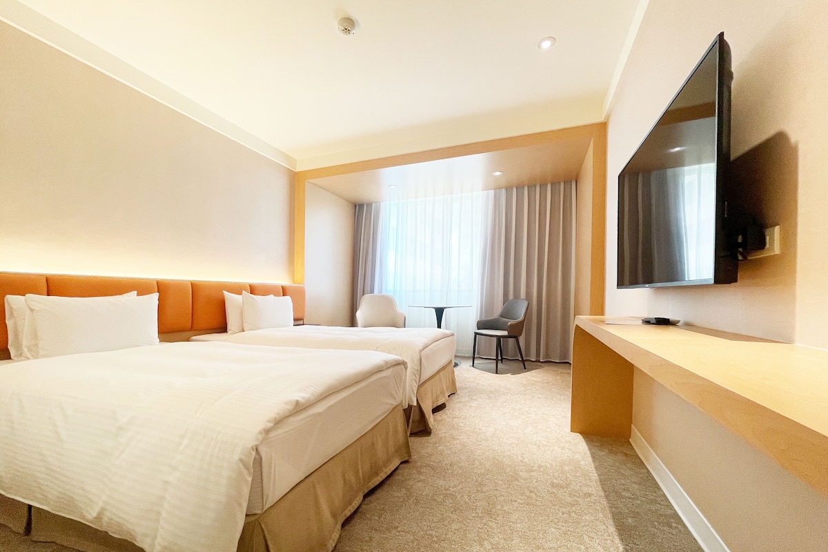 Business-Zweibettzimmer | 1 Schlafzimmer, Verdunkelungsvorhänge, kostenloses WLAN, Bettwäsche