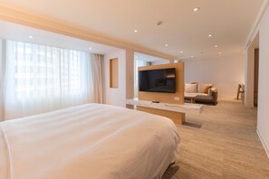 Suite Deluxe, 1 très grand lit, salle de bains attenante | Rideaux occultants, Wi-Fi gratuit, draps fournis