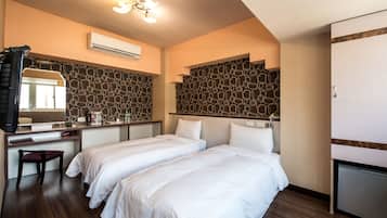 Minibar, desk, blackout drapes, soundproofing