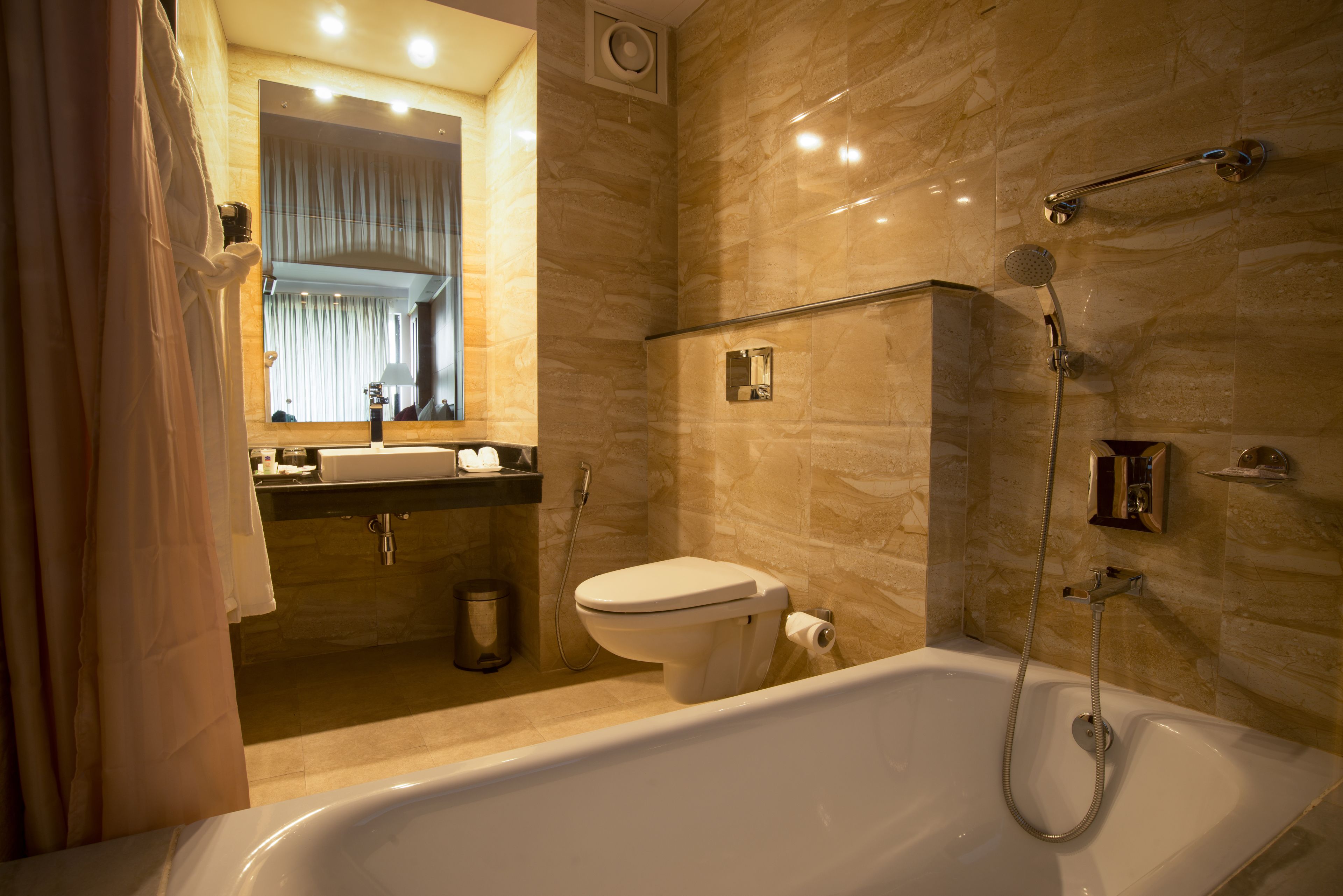 jetted bath, rainfall showerhead, free toiletries, hair dryer